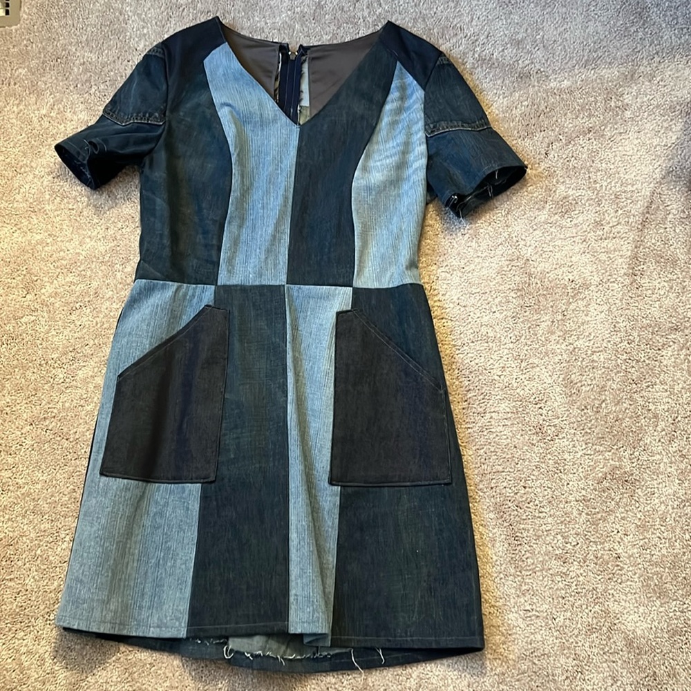 Patched denim dress.